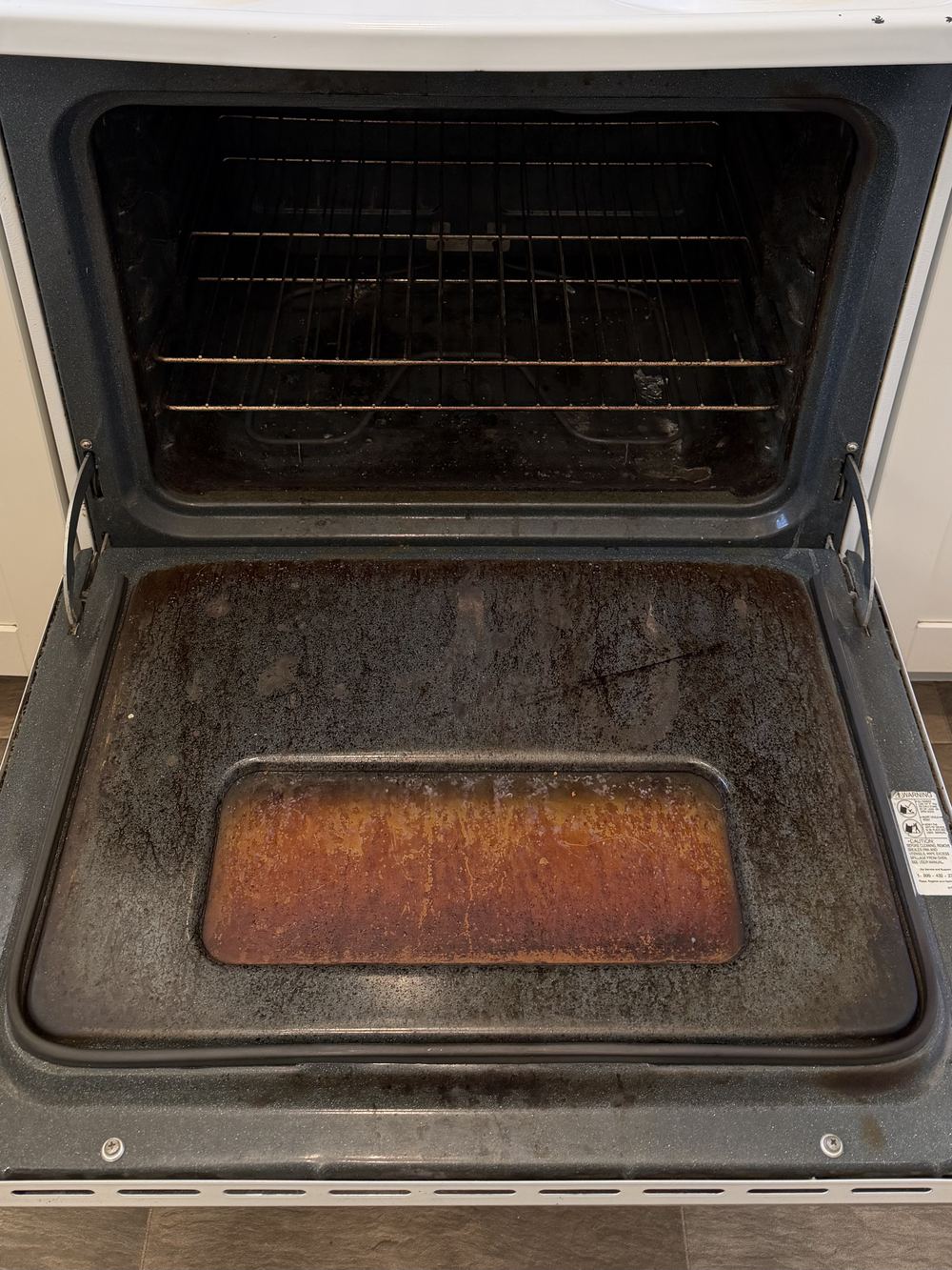 Dirty oven before a deep cleaning in San Jose