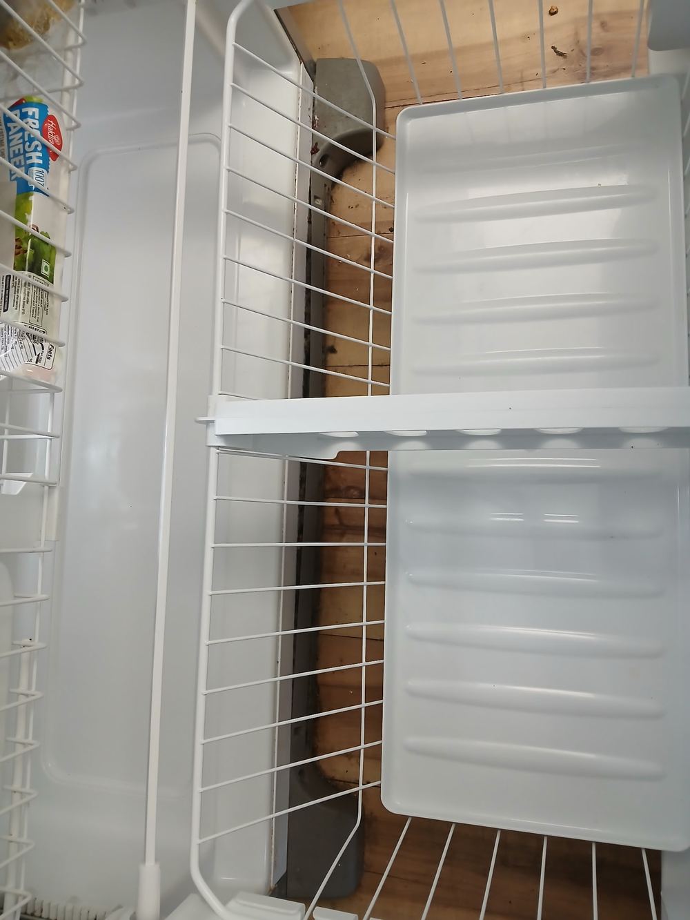 Clean refrigerator interior after professional cleaning in San Jose